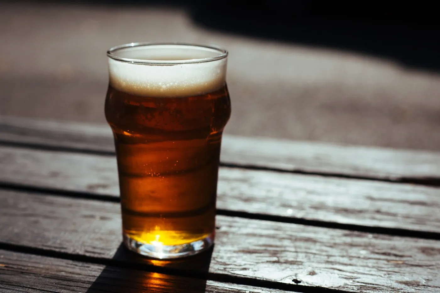 Glass of craft beer served near the beach in Canoa