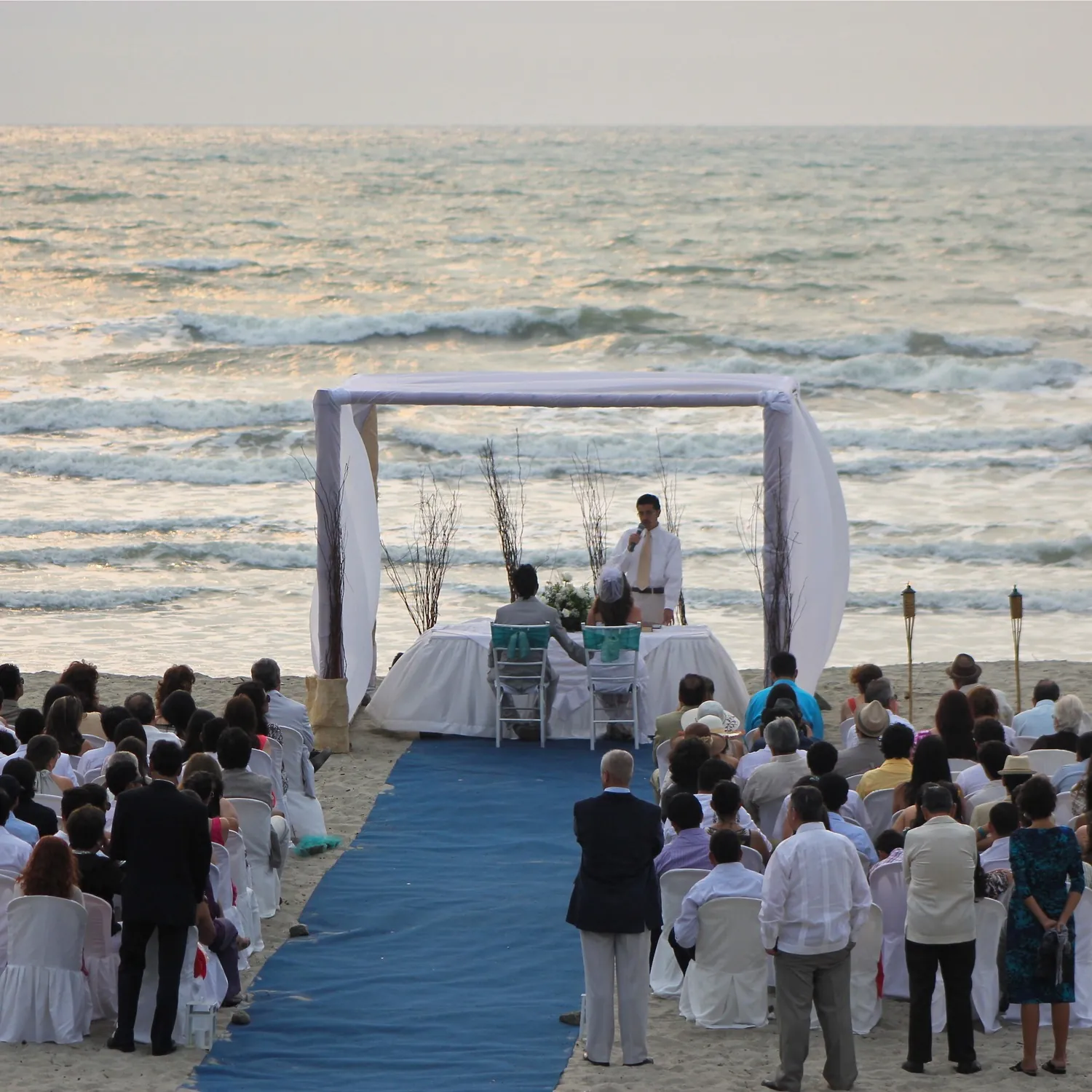 Beach wedding ceremony facing the sea in Canoa, Ecuador