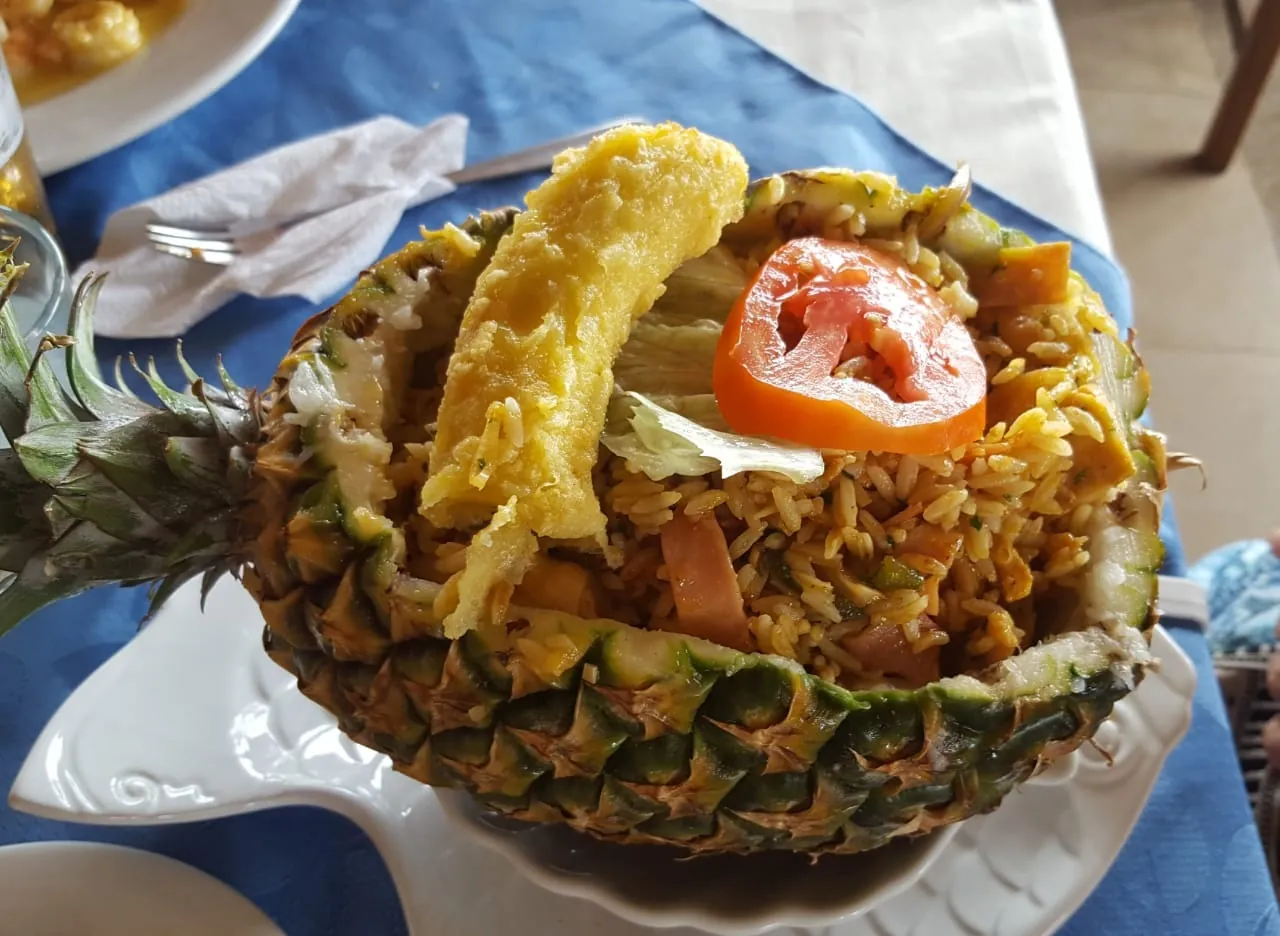 Seafood rice served in a pineapple, a typical Manabí dish in Canoa